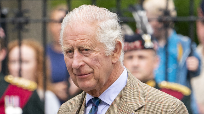 King Charles III smiling 