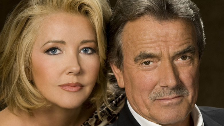 Melody Thomas Scott and Eric Braeden looking serious