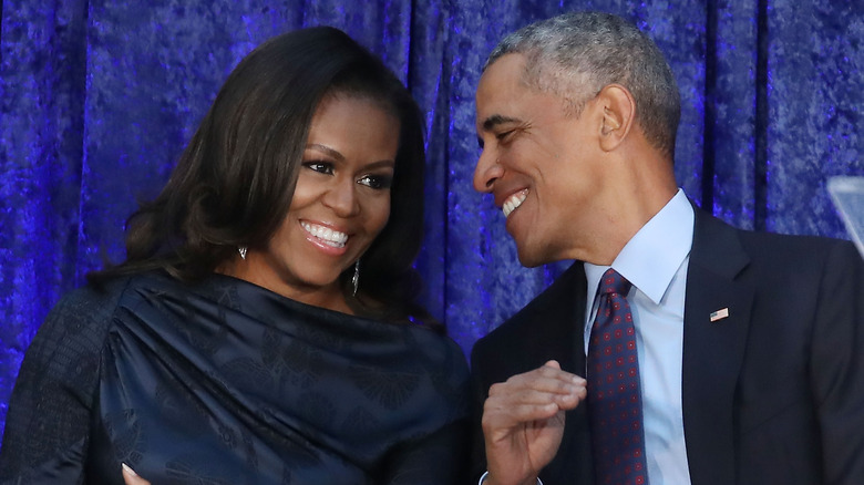 Michelle and Barack Obama laughing together