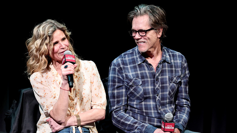 Kyra Sedgwick and Kevin Bacon speaking at a SAG-AFTRA event in 2023