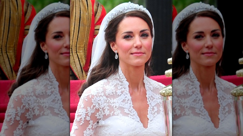 Catherine, Duchess of Cambridge wearing lace wedding dress and tiara