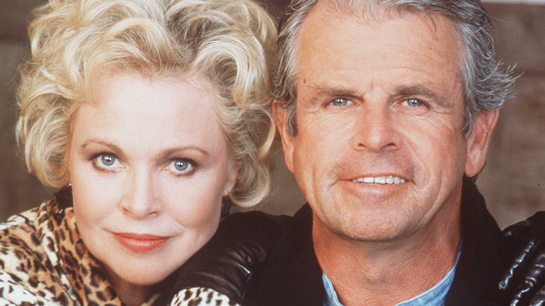 Michelle Phillips and William Devane in a promo shot for Knots Landing