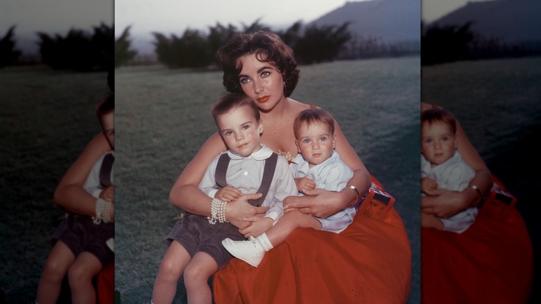 A photo of Elizabeth Taylor and her sons circa the '50s