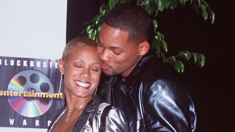 Will Smith and Jada Pinkett Smith attending a Blockbuster Entertainment Awards event in 1997.
