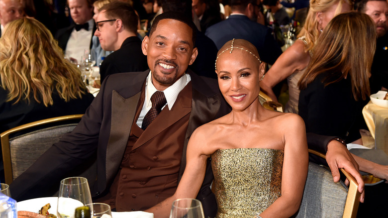 Will Smith and Jada Pinkett Smith smiling at the 2022 Critics Choice Awards.