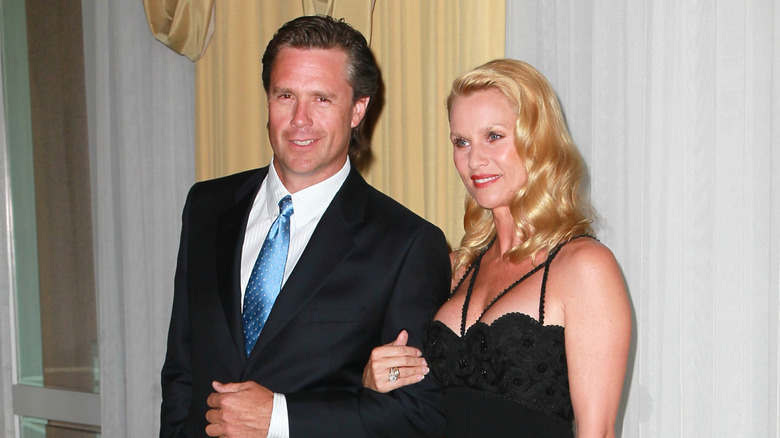 Nicollette Sheridan and Steve Pate at an event in 2011
