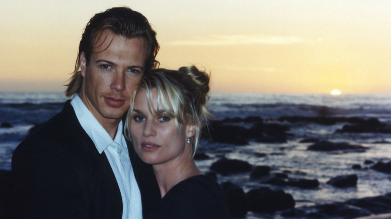 Nicollette Sheridan and Simon Main on a beach in 1998