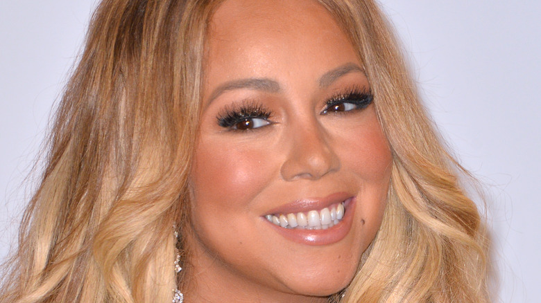 Mariah Carey smiling at an event