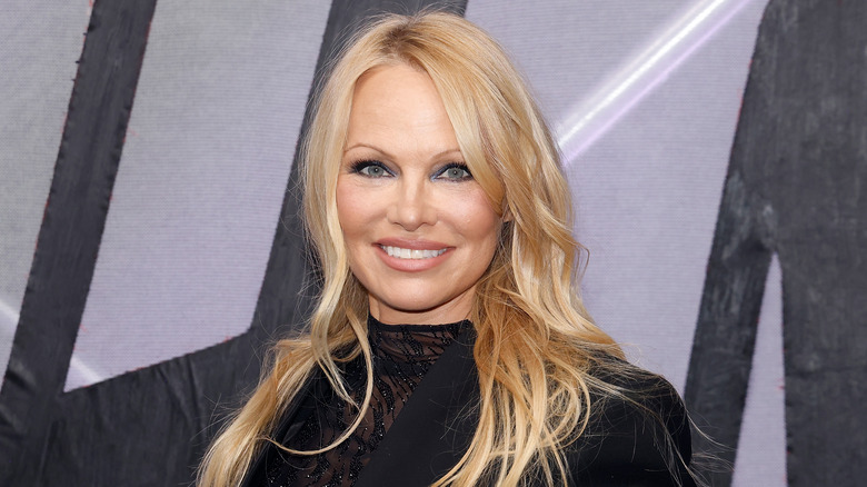 Pamela Anderson posing for photo