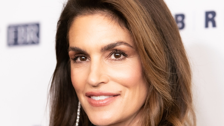 Cindy Crawford smiles on the red carpet
