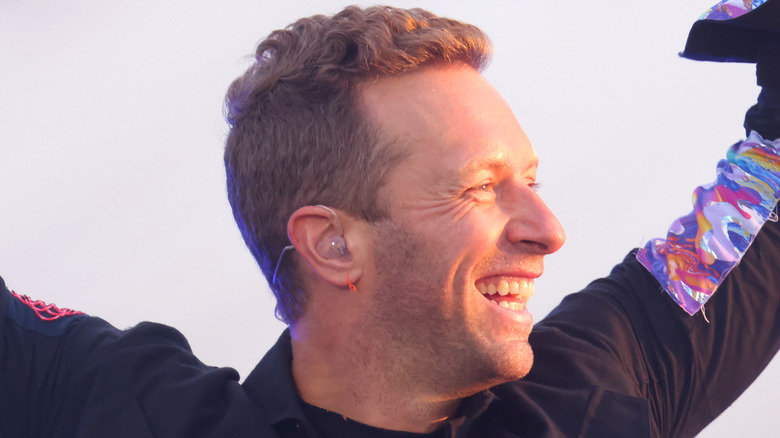 Chris Martin smiling while performing