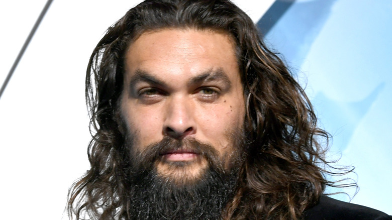 Jason Momoa smolders on the red carpet