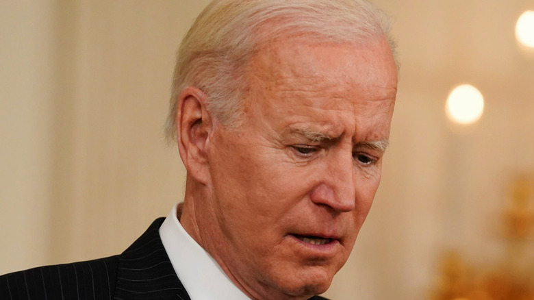 Joe Biden holding a folder