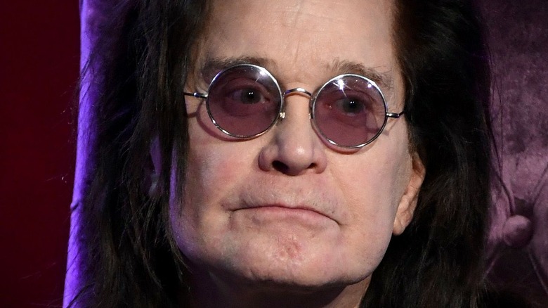 Ozzy Osbourne wearing glasses