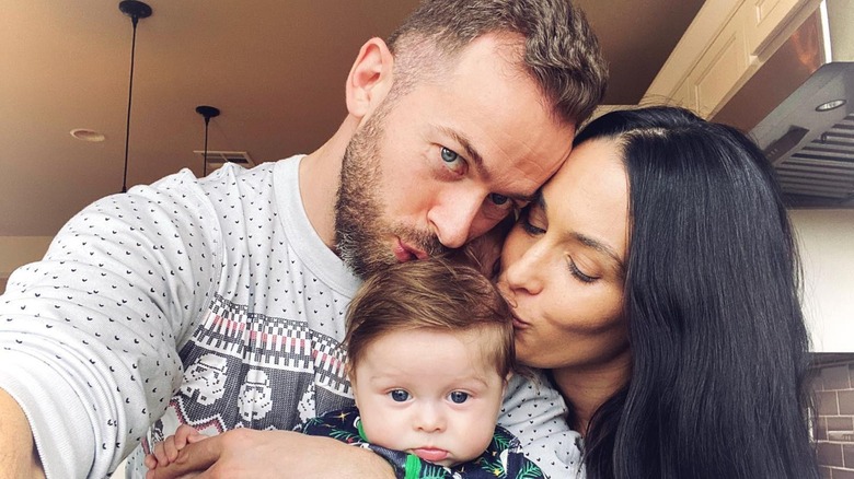 Artem Chigvintsev with Nikki Garcia and their son
