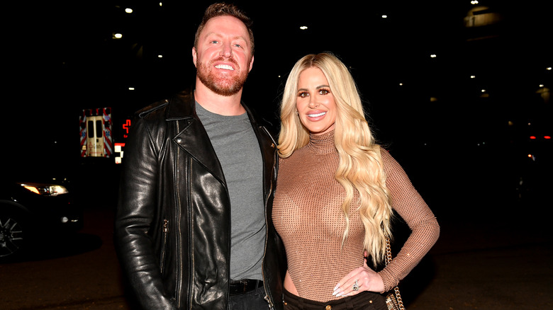 Kroy Biermann and Kim Zolciak posing