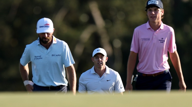 Rory McIlroy and Cameron Young not talking during the Masters