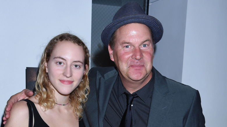 Actor Sean O' Bryan wears a fedora and has his arm around his daughter Mckayla