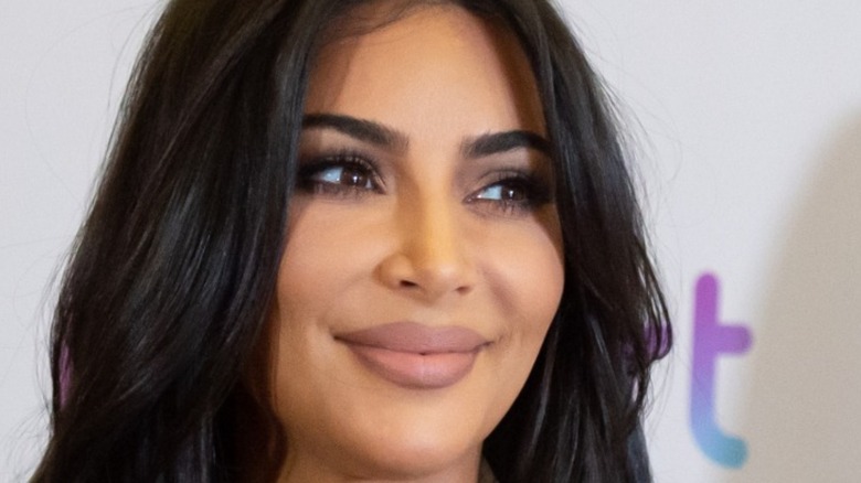 Kim Kardashian posing on the red carpet