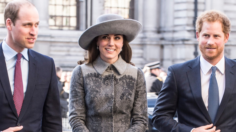 prince william, kate middleton, and prince harry smiling