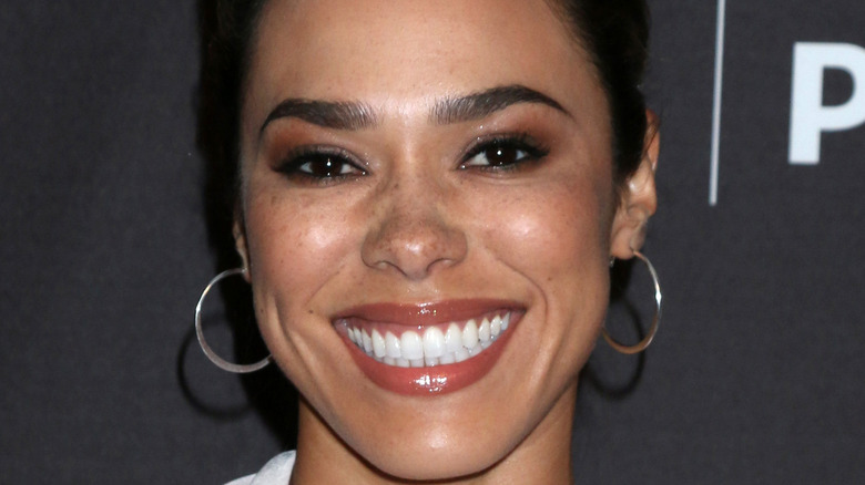 Jessica Camacho smiling, red carpet