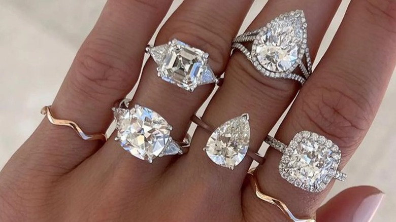 Woman wearing multiple diamond rings