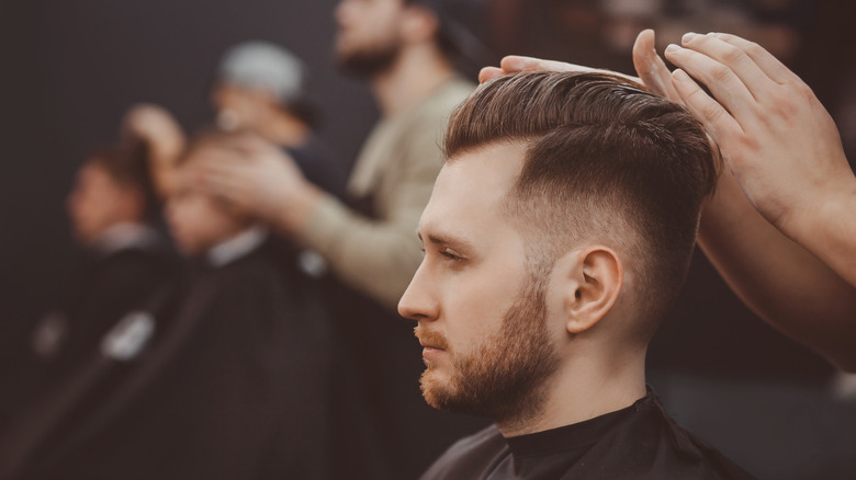 man getting a haircut