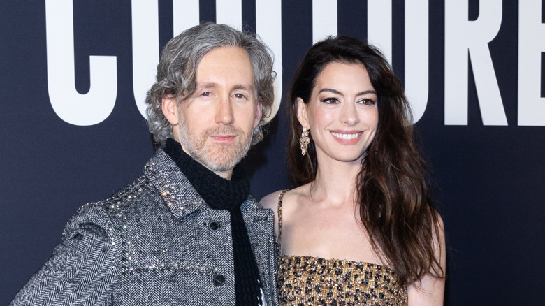 Adam Shulman and Anne Hathaway at Paris Fashion Week on January 25, 2023