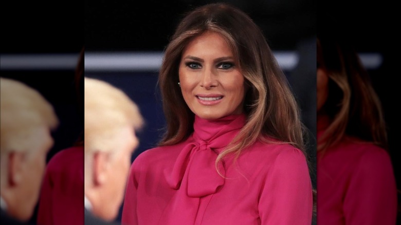 First Lady Melania Trump wearing a Gucci blouse with a pink bow