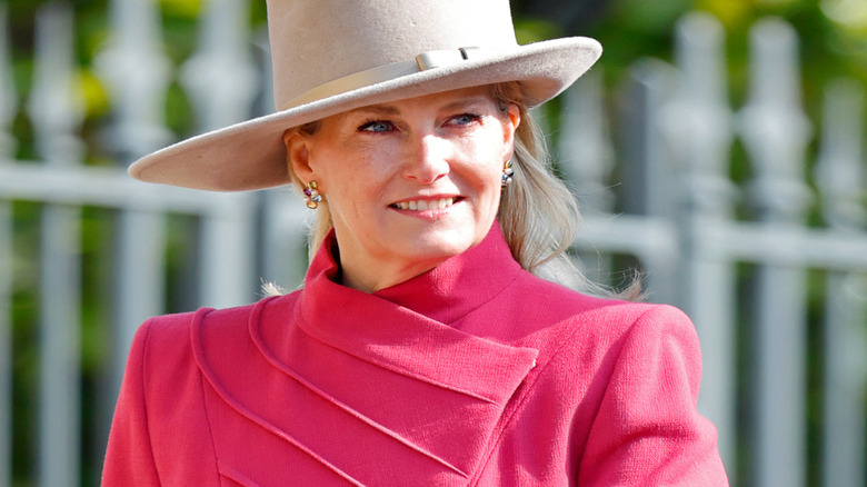 Sophie wearing a red coat