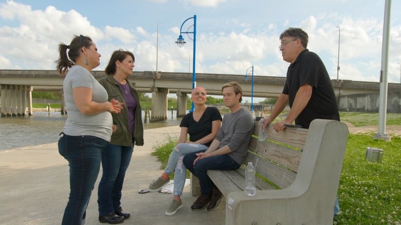 Tyler Henry and Theresa Koelewyn talking to family