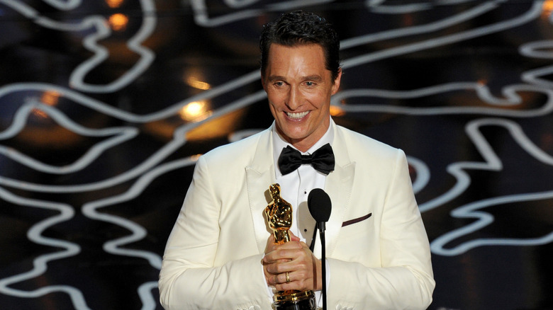 Matthew McConaughey smiling during his Oscar acceptance speech.
