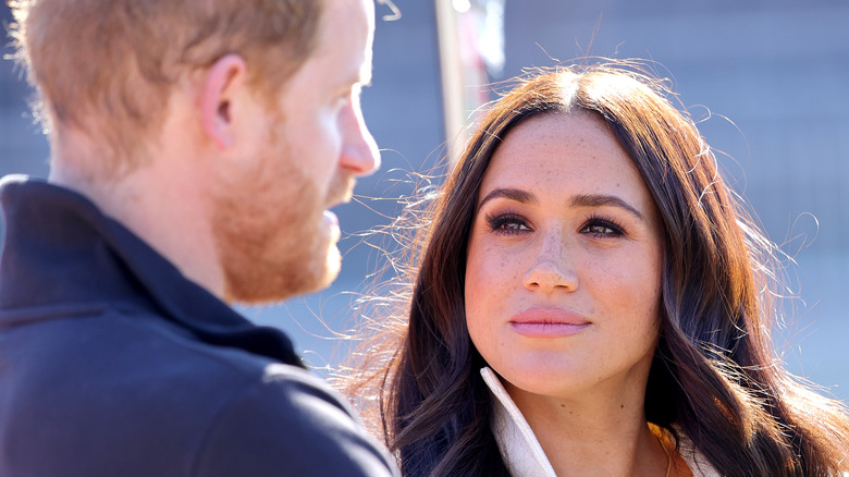 Meghan Markle looking at Prince Harry