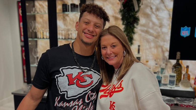 Patrick Mahomes and Randi Mahomes take a photo together