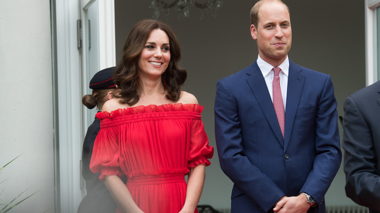 Kate Middleton wearing a red dress