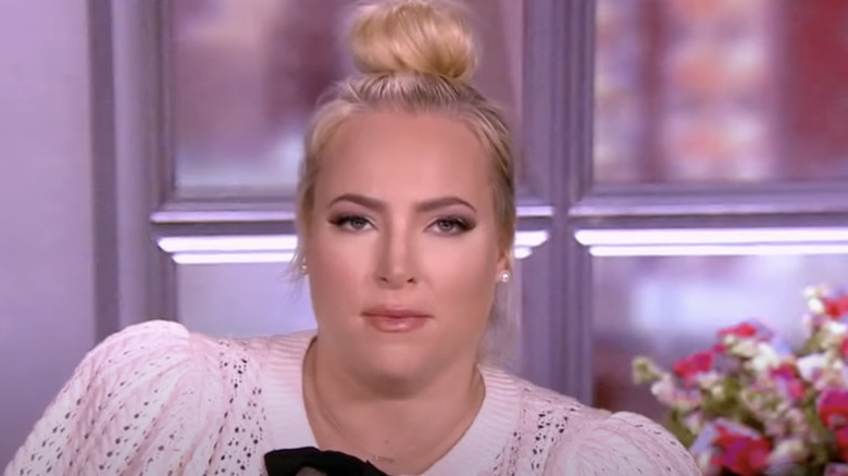 Meghan McCain in pink, puff-sleeve cardigan