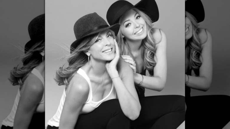 Tiffany Trump pictured with her mother, Marla Maples, with both wearing large, black hats