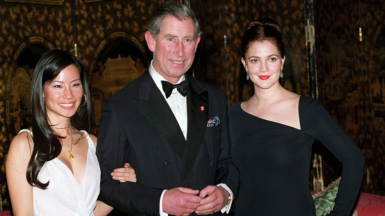 Lucy Liu, King Charles, and Drew Barrymore smiling together