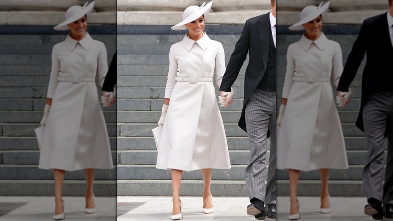 Meghn Markle walking and smiling