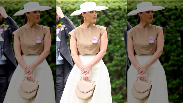 Princess Eugenie holding a purse