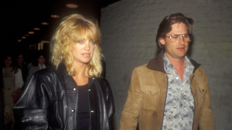 Goldie Hawn and Kurt Russell attending "Footloose" Premiere