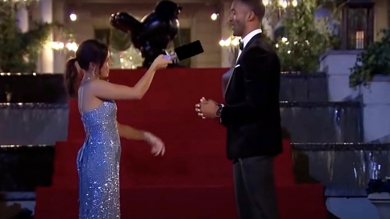 Katie points vibrator at Matt