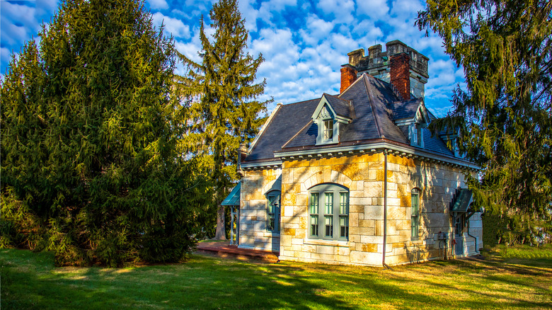 stone house and front yard