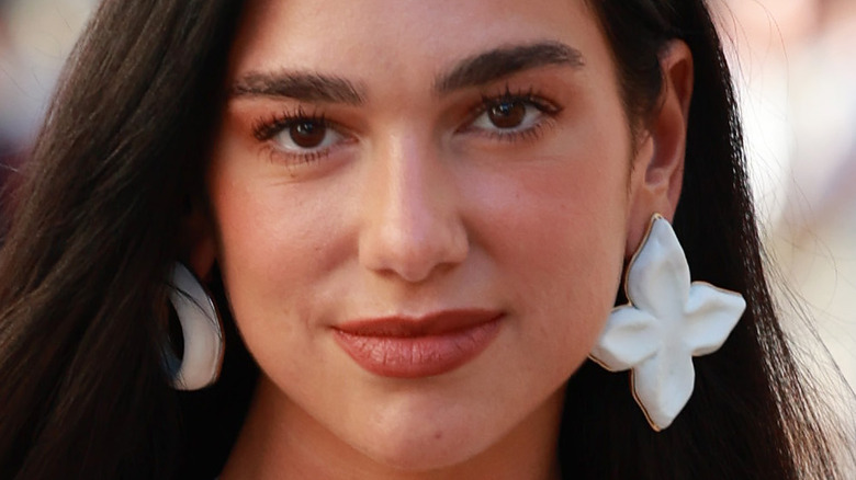 Dua Lipa with large earrings