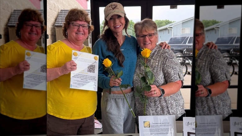 Kristi Noem posing with two women