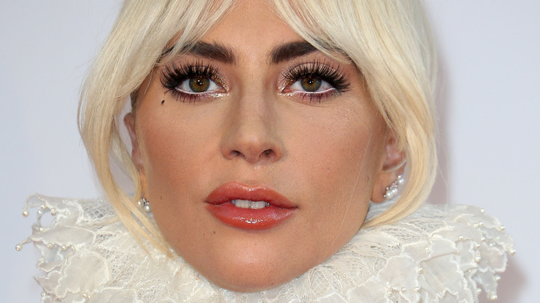 Lady Gaga appears with blonde hair