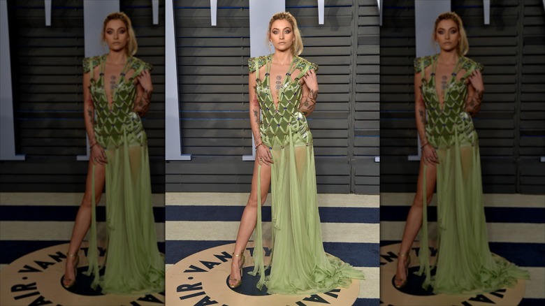 Paris Jackson on the Vanity Fair after-party carpet in a green gown