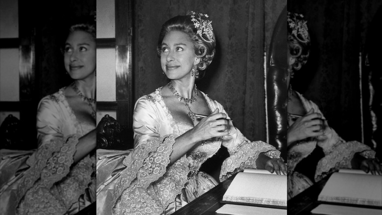 Princess Margaret smiling in a 19th century Georgian ballgown