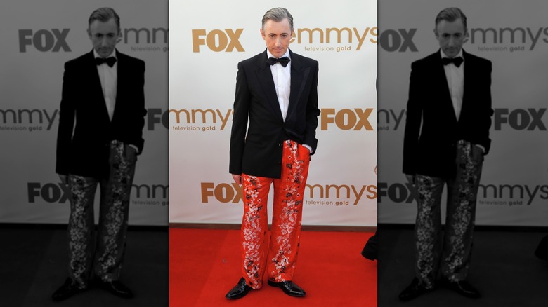 Alan Cumming on the orange carpet at the 2011 Emmys