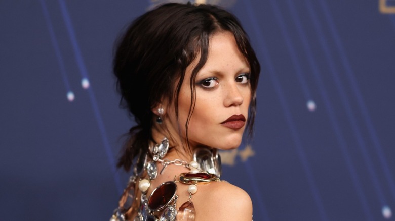 Jenna Ortega posing at at the 77th Primetime Emmy Awards in 2025